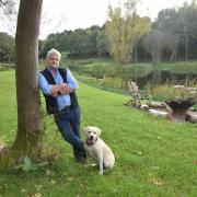 Nigel Marsh and his dog, Lily, at the My Mini Break North Norfolk camping and glamping site at Edgefield.