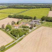 A bid to demolish a farmhouse and see it rebuilt has been submitted to NNDC.