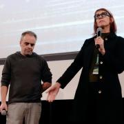 Director Joel Souza, left, and cinematographer Bianca Cline, right, attend the premiere of the film Rust in Torun, Poland (Czarek Sokolowski/AP)